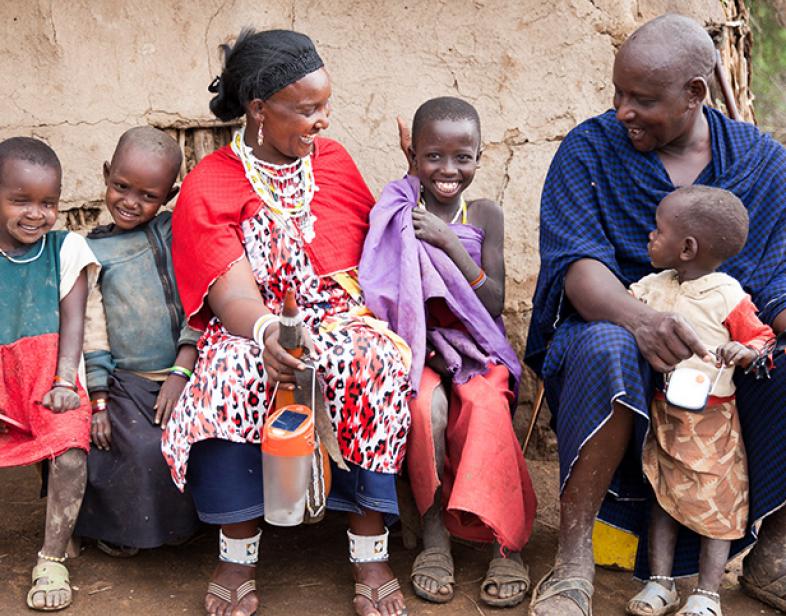 Solar Sister Entrepreneur Namnyaki with her family in Tanzania